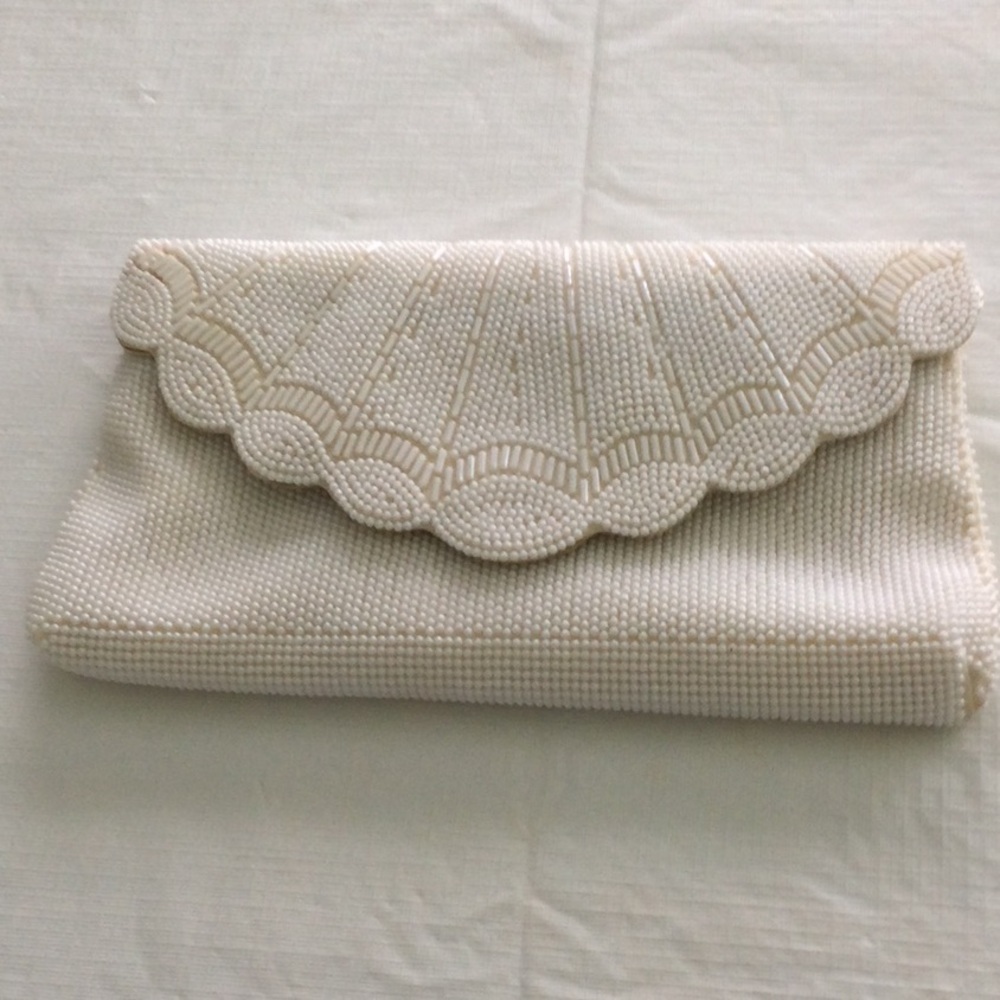 Woman’s Scallop Beaded Clutch Purse Size 10” x 6” color Ivory snap to close.